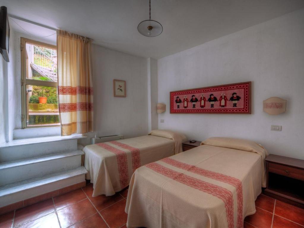 Affitta Camere Casa Delle Rose Villanova Monteleone Exterior foto